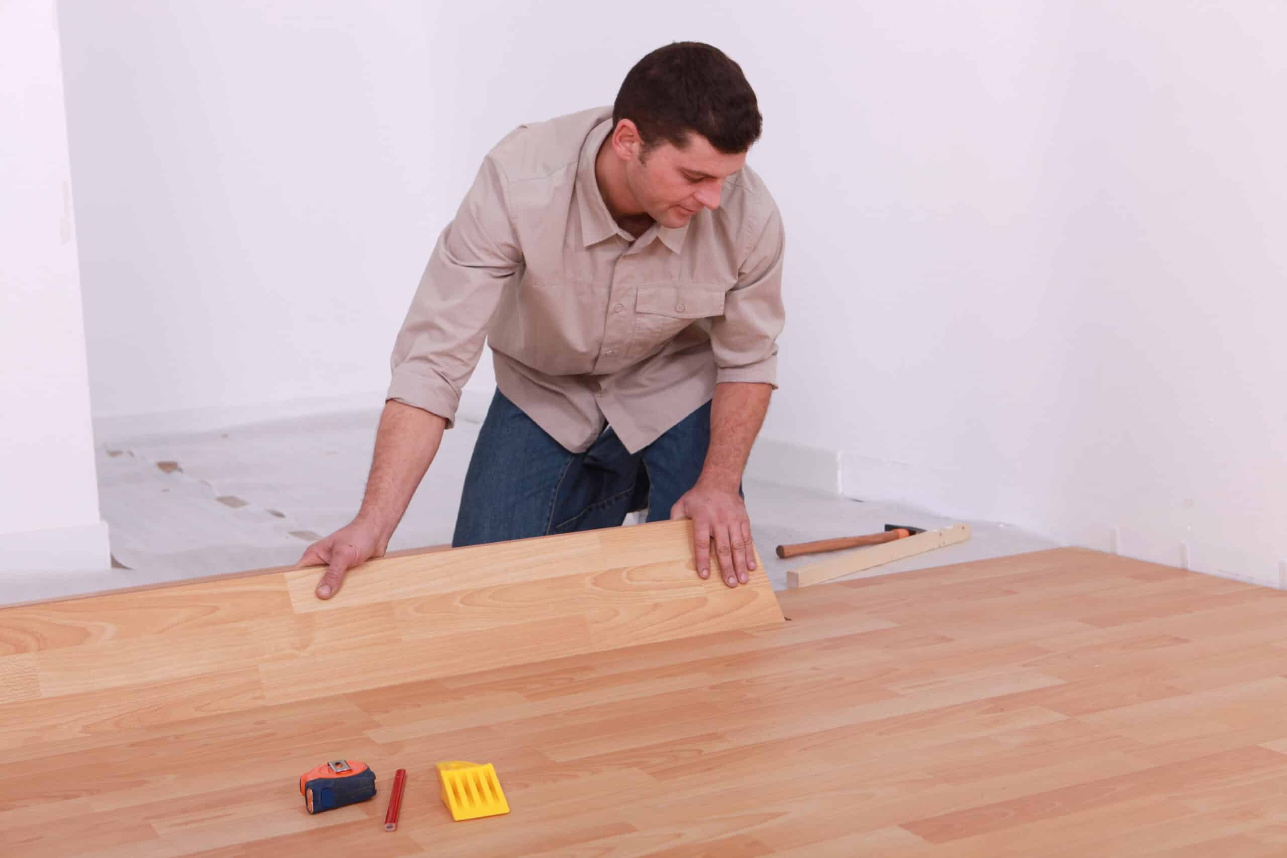 Portrait of a Man doing some floor restoration