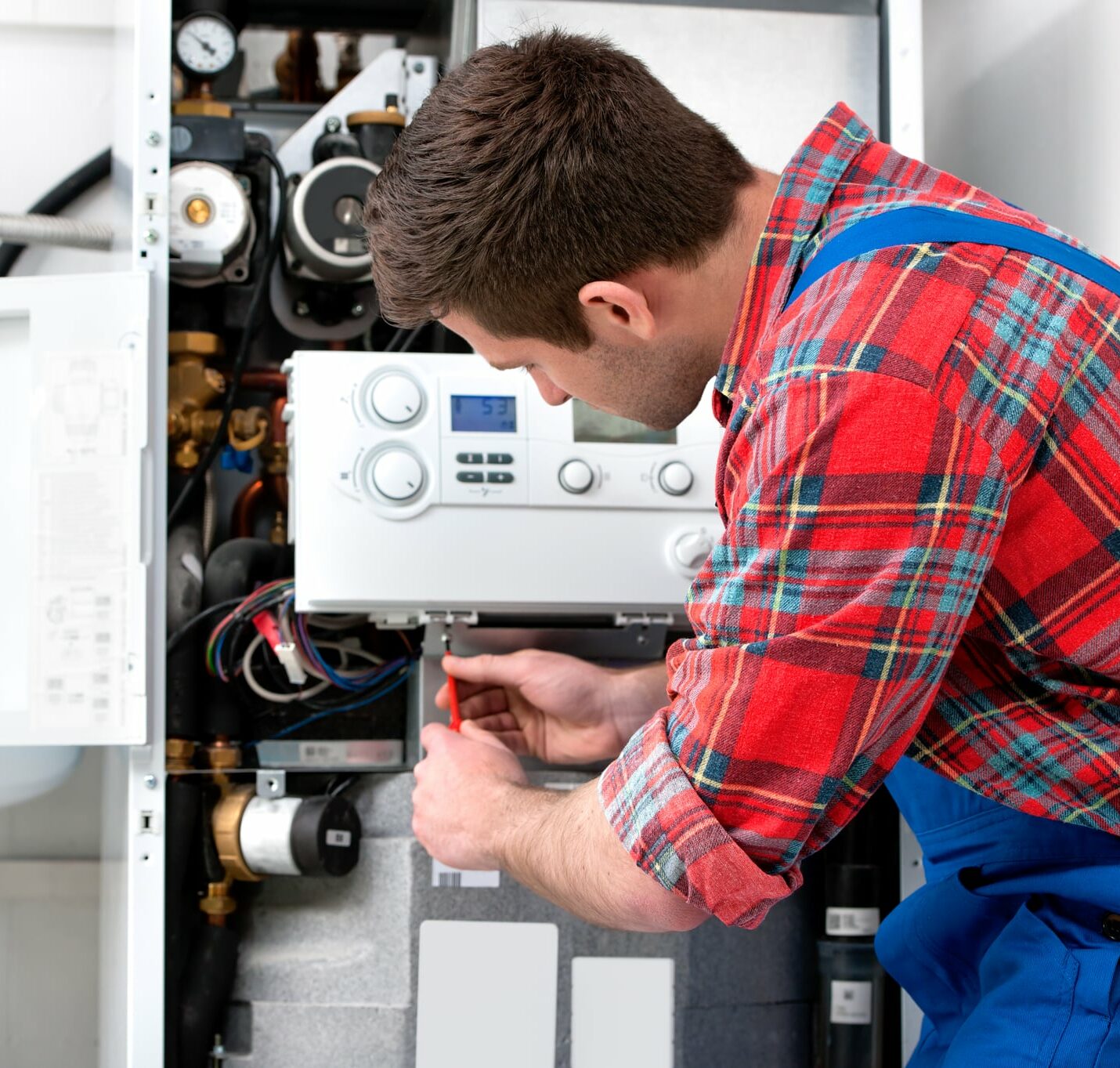 Portrait of a Technician servicing Boiler Installation