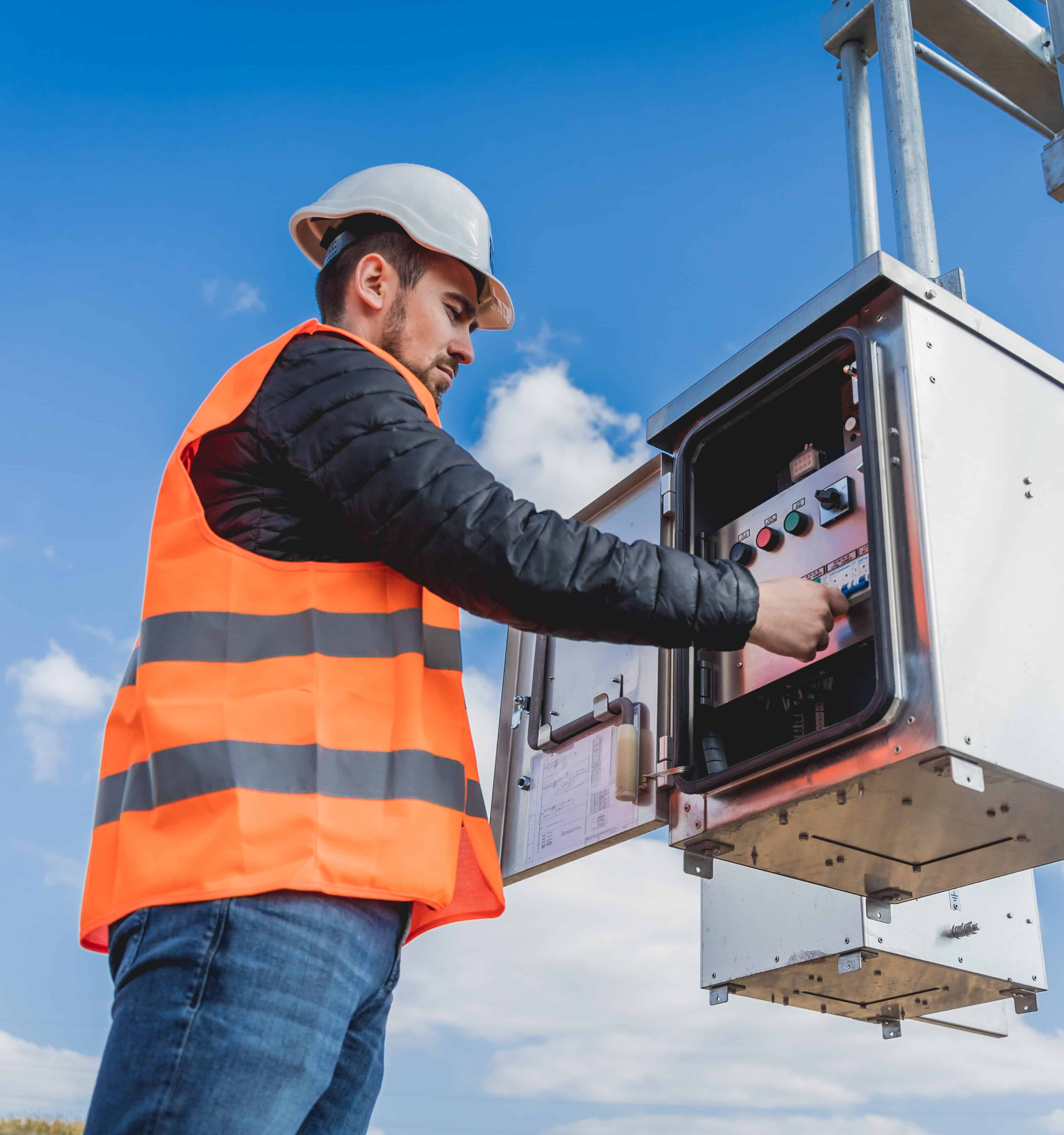 Portrait of a Engineer electrician check the substation construction process of a Generator