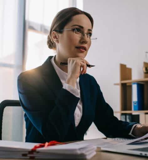 Portrait of a Woman in a desk working as a Criminal Solicitor