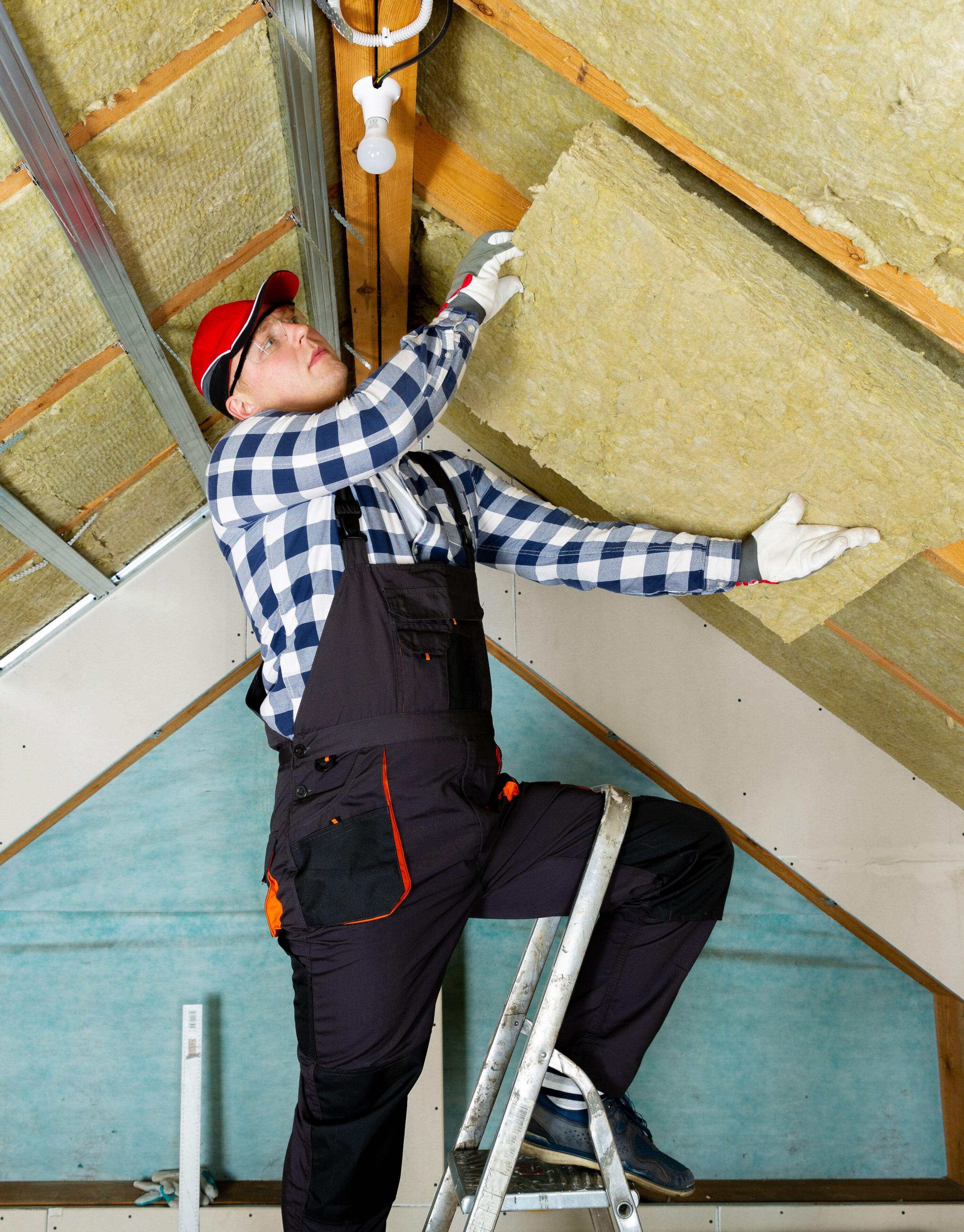 using mineral wool panels. Attic renovation and insulation concept