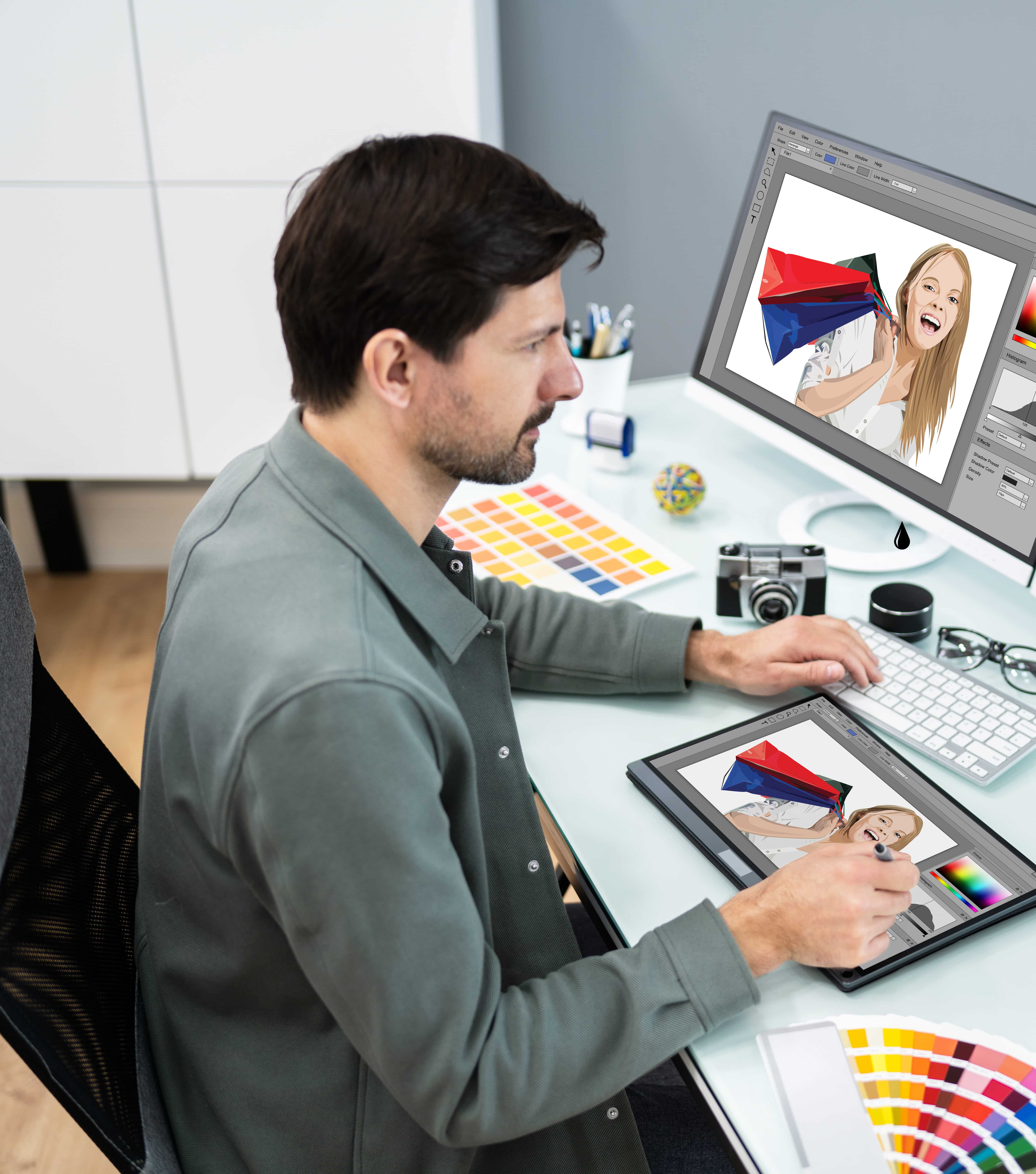 Graphic Designer And Photographer Using Multiple Computer Screens
