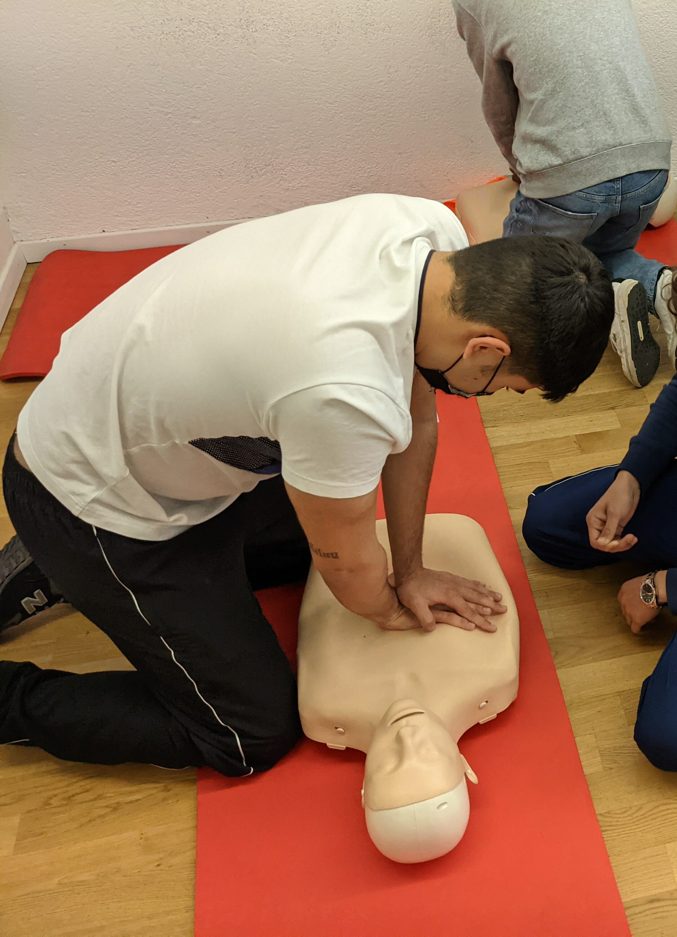 Portrait of a Man giving a First Aid Class